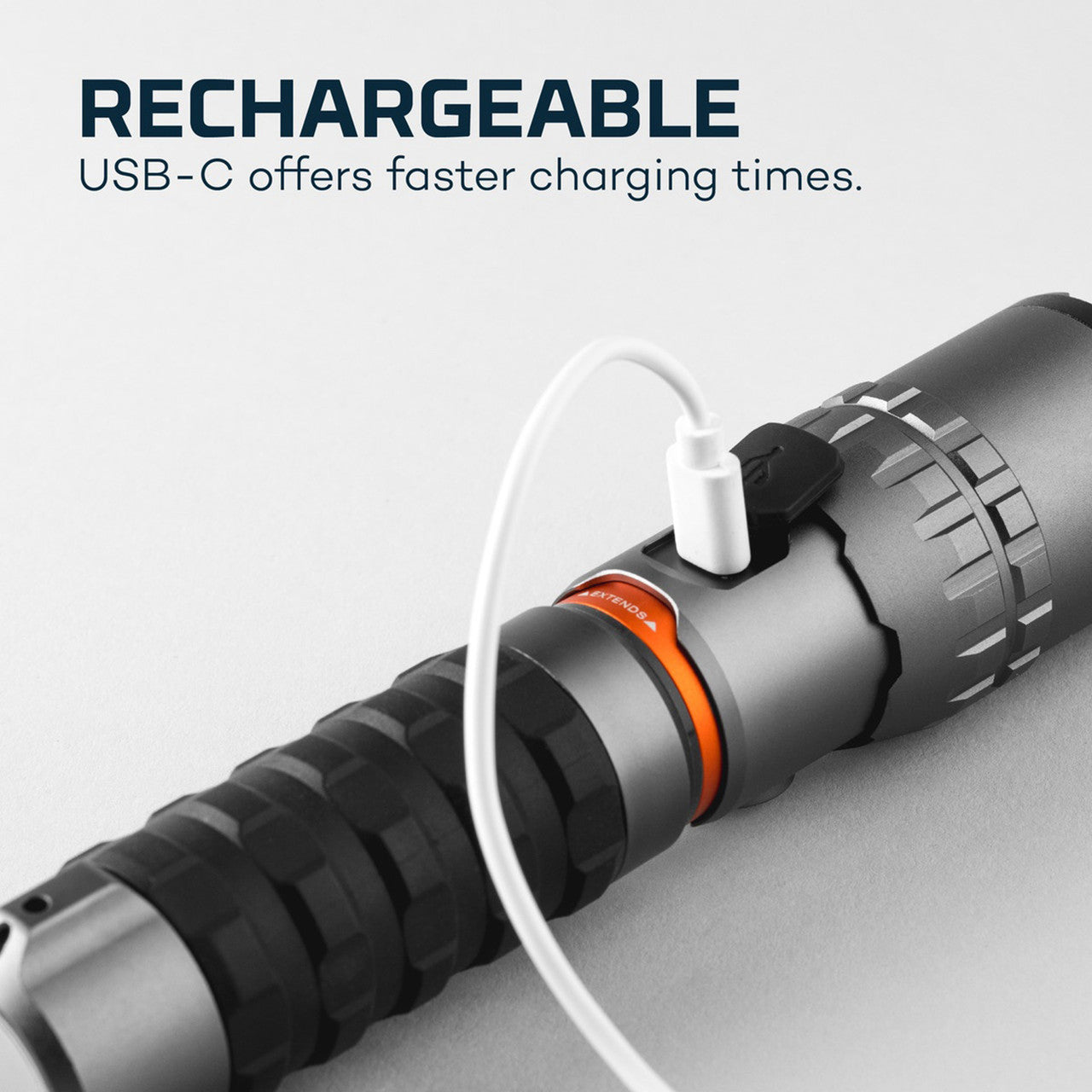 Rechargeable flashlight with a USB-C charging port connected.
