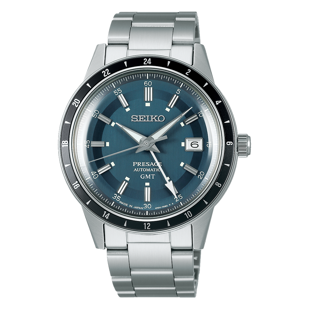 Stainless steel Seiko wristwatch with a blue dial and black bezel.
