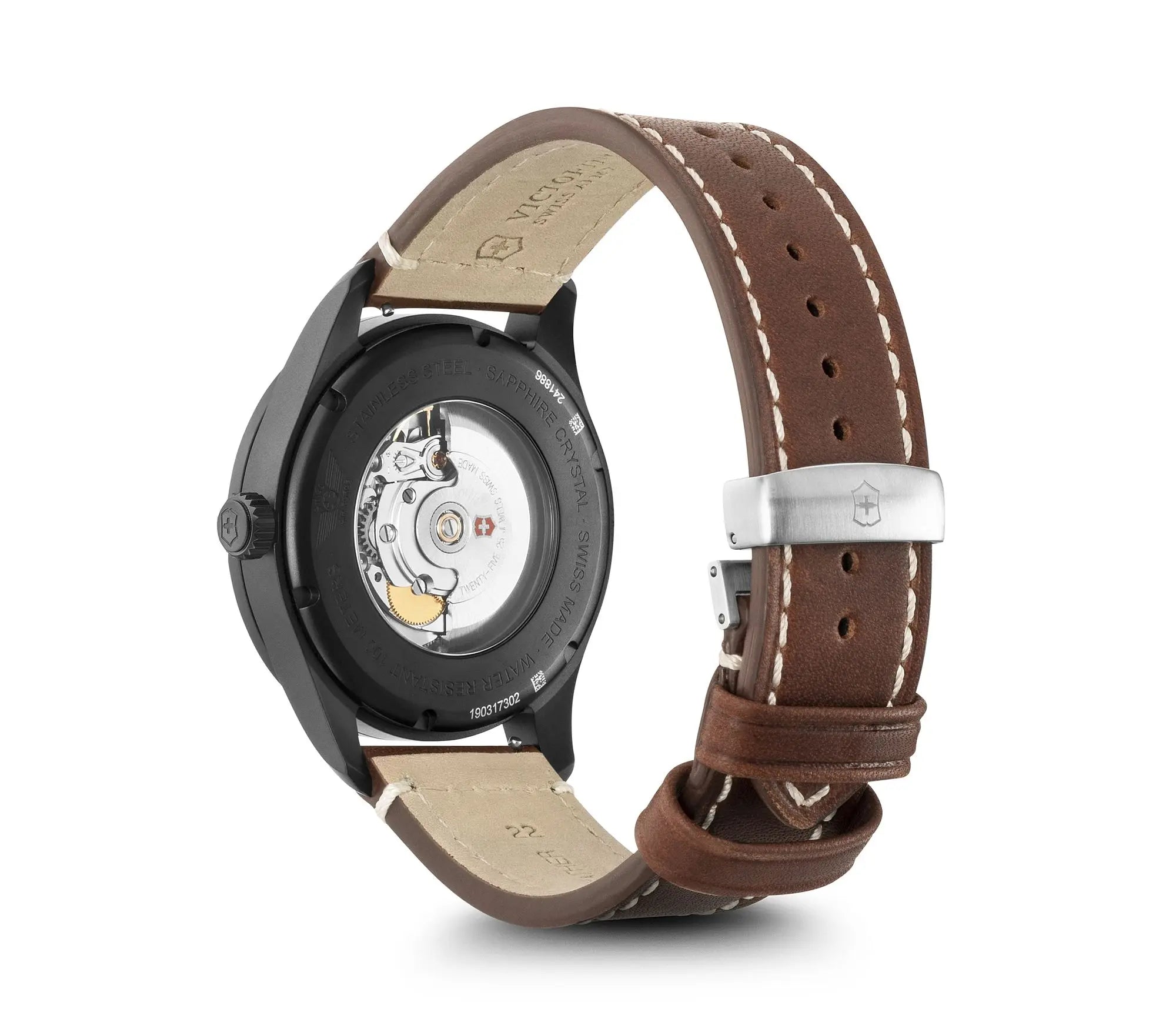 Wristwatch with a brown leather strap and visible mechanical movement through the case back.