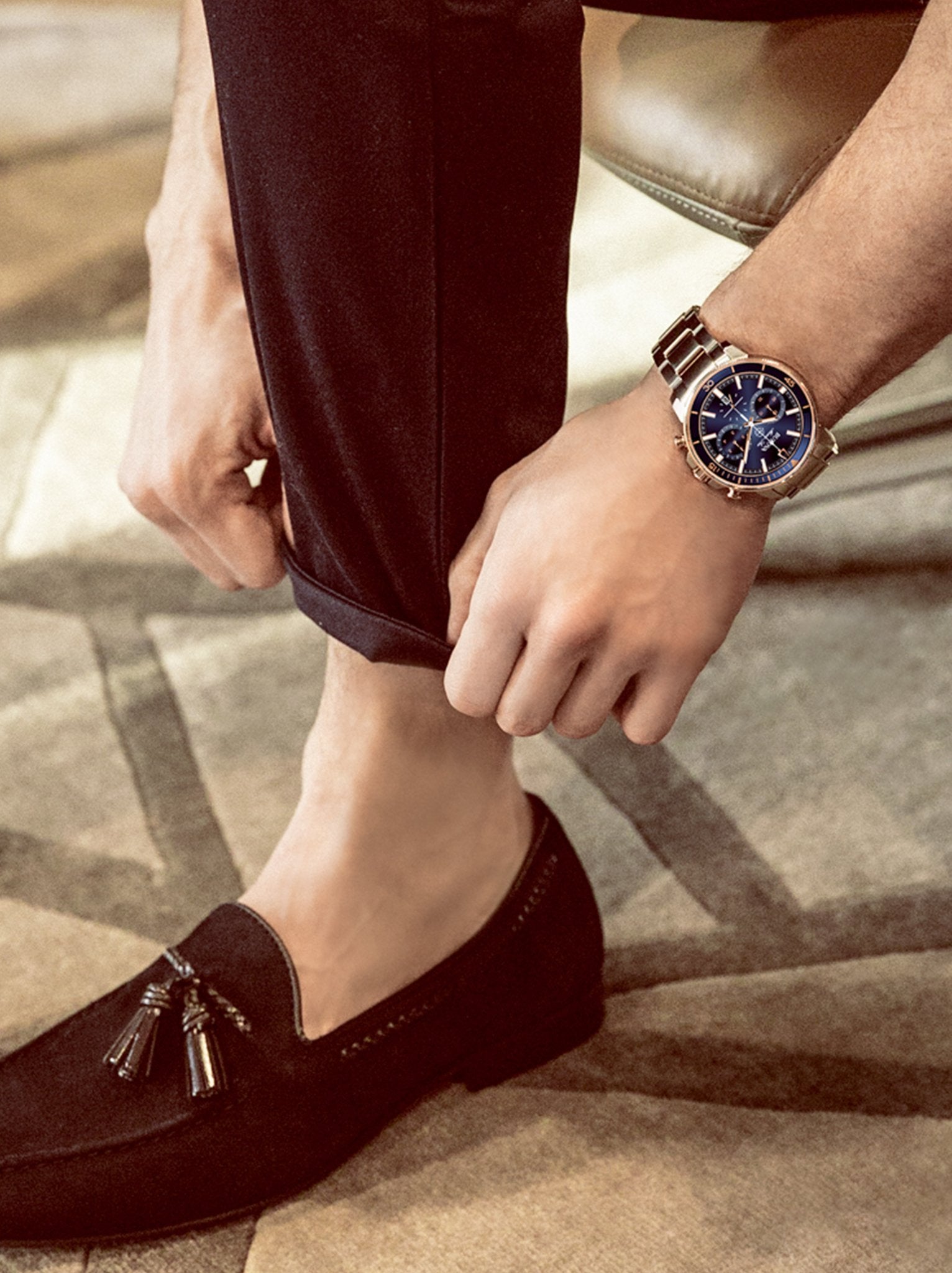 Bulova Marine Star Chronograph Men's Watch 98B301 with blue dial and rose gold-tone bezel on wrist.