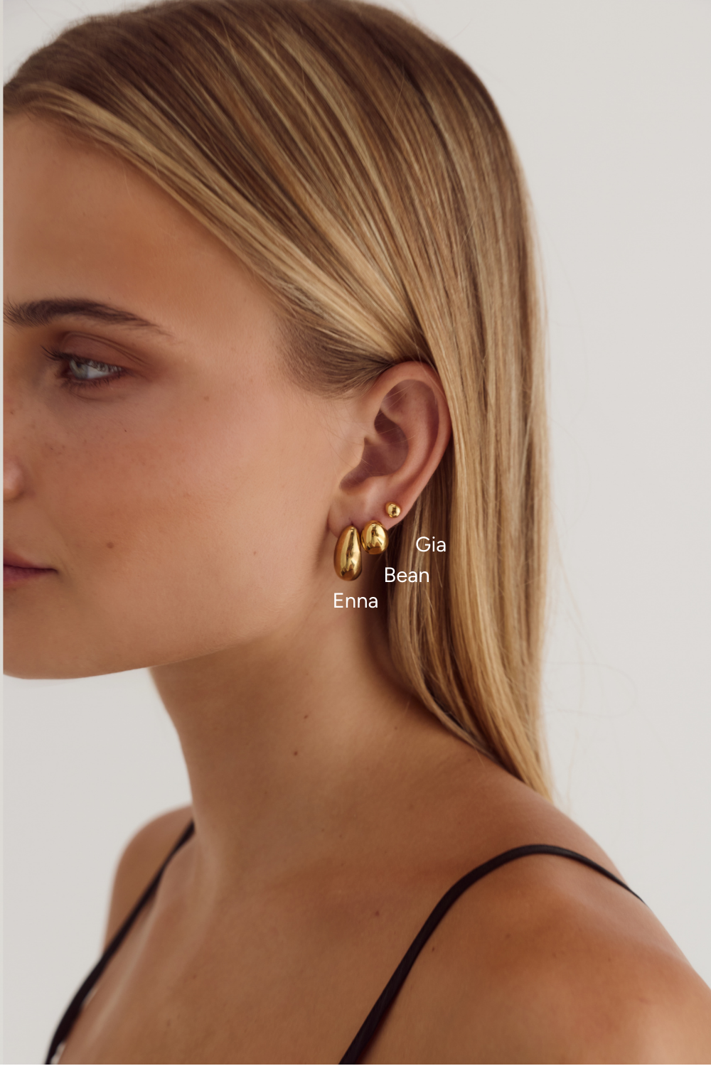 Cendré Bean gold earrings product shot