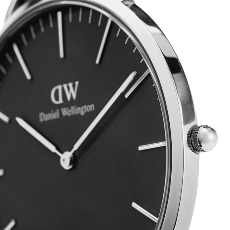 Sleek wristwatch with a black dial and silver case, displaying the ’Daniel Wellington’ brand.