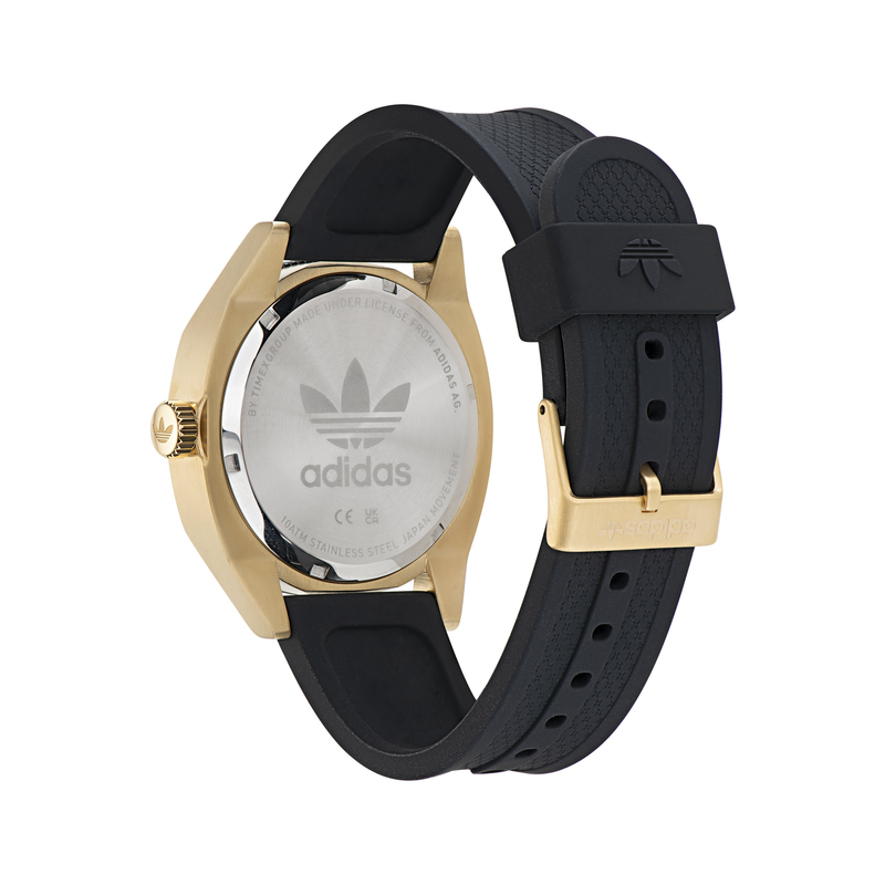 Gold-toned Adidas wristwatch with a black rubber strap.