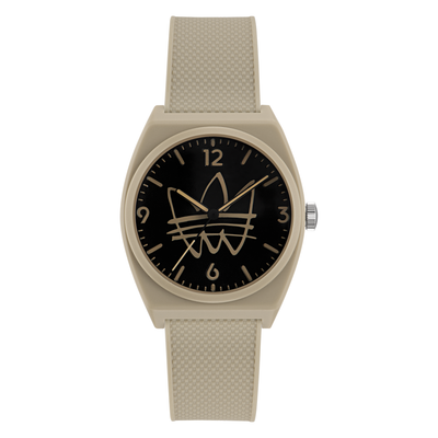 Beige wristwatch with a black dial featuring the Adidas trefoil logo.