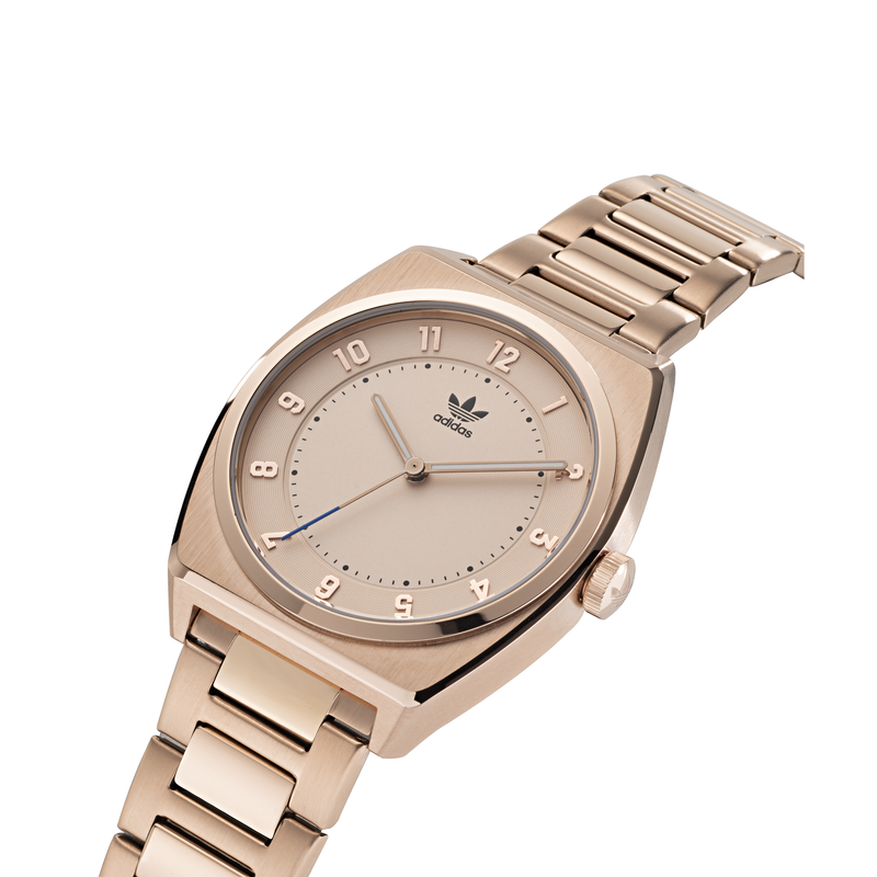 Rose gold wristwatch with a metallic bracelet and analog display.