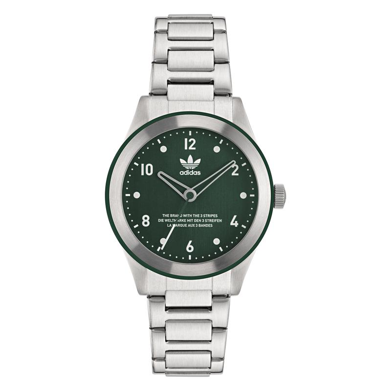 Silver wristwatch with a green dial featuring the Adidas logo.