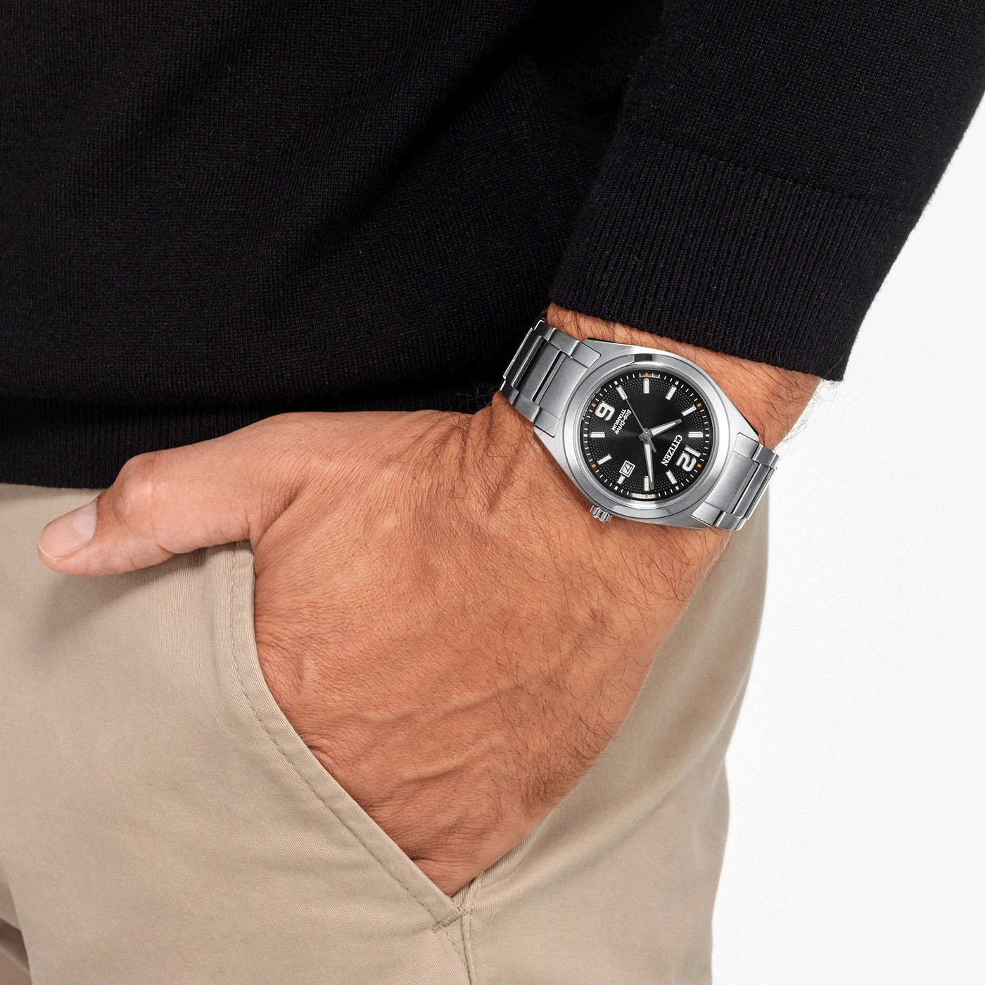 Citizen AW1641-81E Super Titanium black dial watch worn on the wrist, lifestyle view