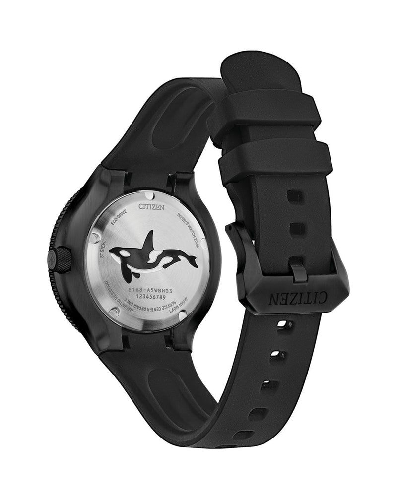 Black wristwatch with a silhouette of a whale or dolphin on its face.