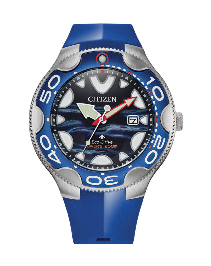 Citizen dive watch with a blue bezel and strap, featuring a camouflage-patterned dial.