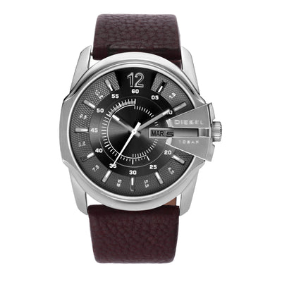 Wristwatch with a silver case, dark dial, and brown leather strap.