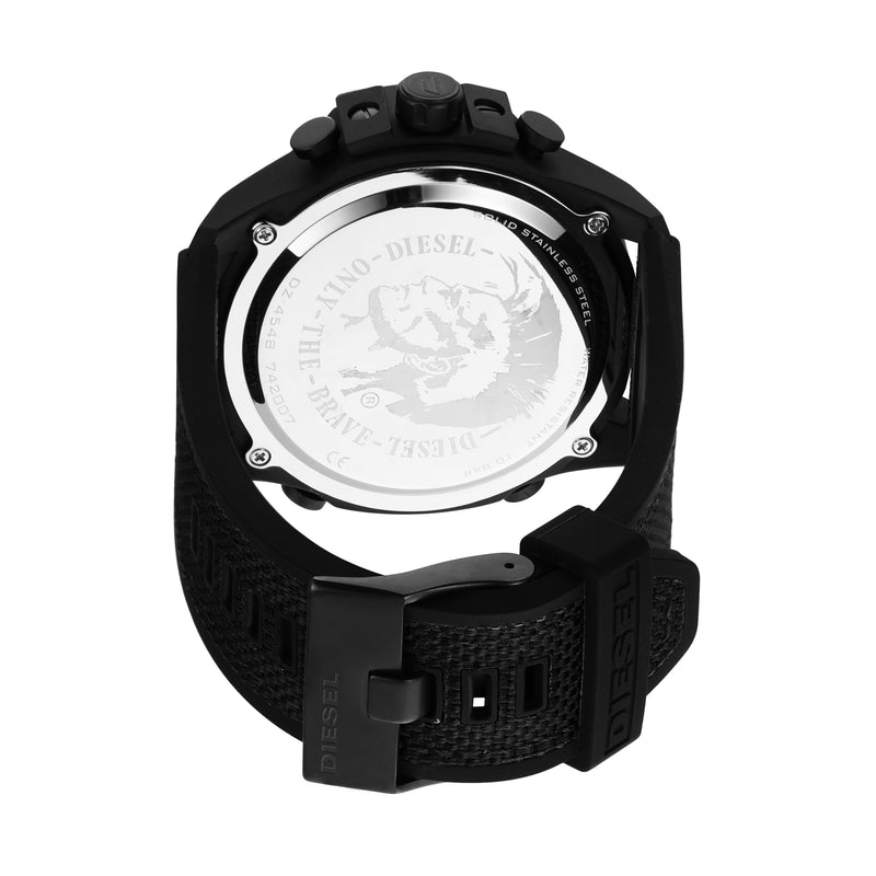 Black wristwatch with a visible caseback displaying an engraved design.