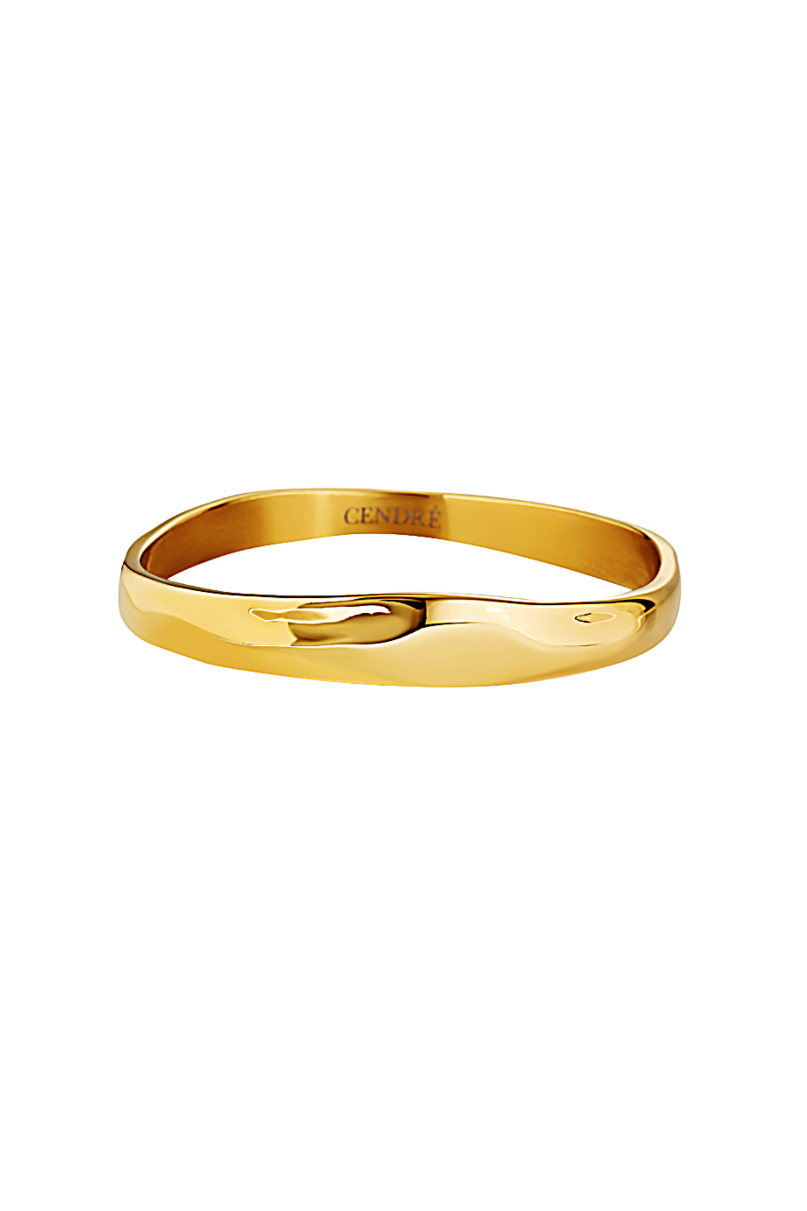 Cendré Demi gold bangle on a white background