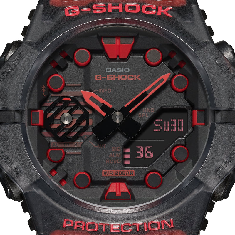 G-Shock watch with a black and red color scheme featuring digital and analog displays.