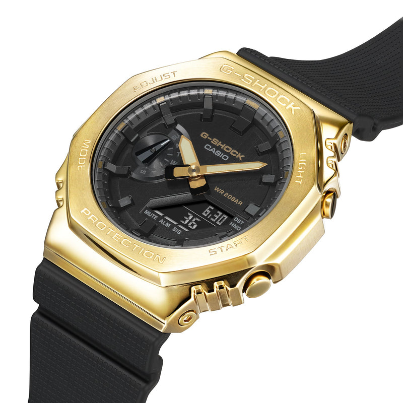 Gold and black analog-digital wristwatch with an octagonal bezel and rubber strap.