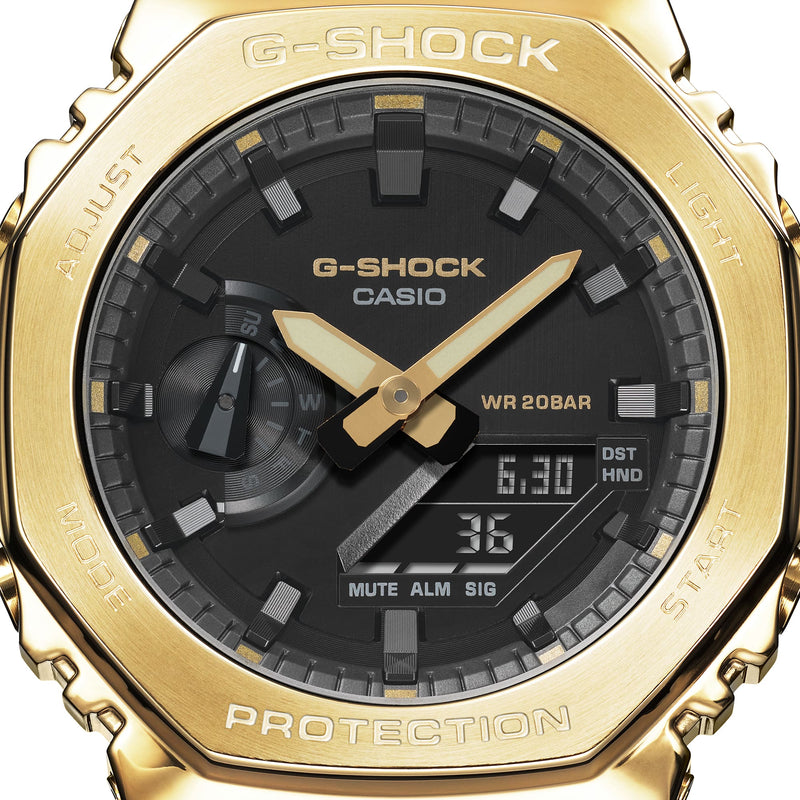 Gold and black G-Shock Casio wristwatch with analog and digital displays.