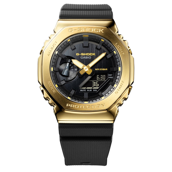 Gold and black G-Shock wristwatch with a digital-analog display.