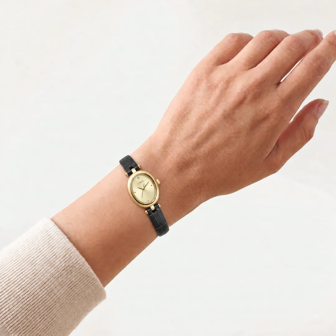 Jag Emilie Gold Dial Black Leather Womens Watch J3072 worn on the wrist