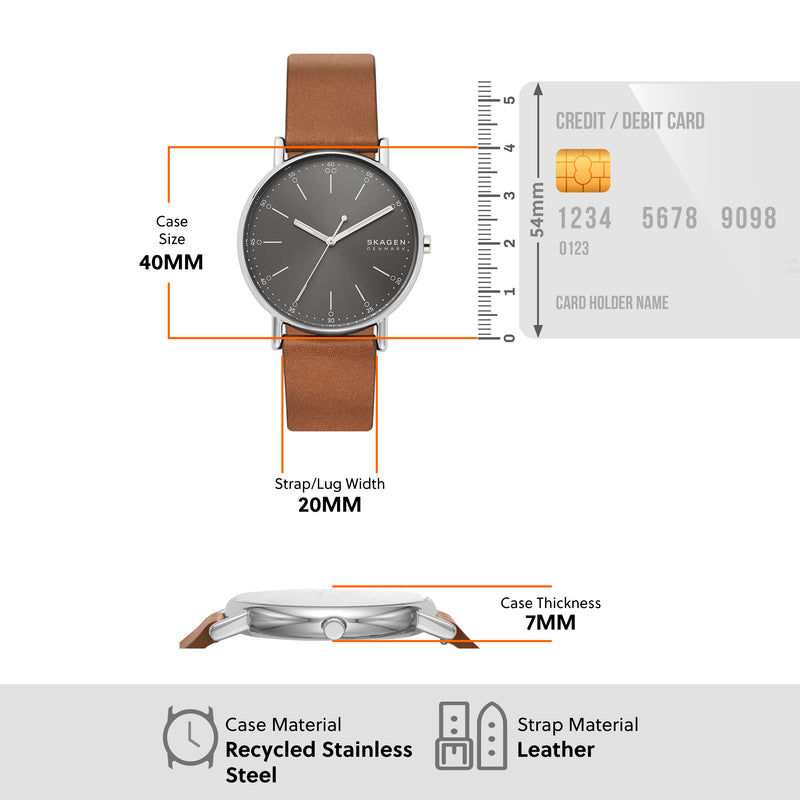 Minimalist wristwatch with a brown leather strap and dark gray circular face.