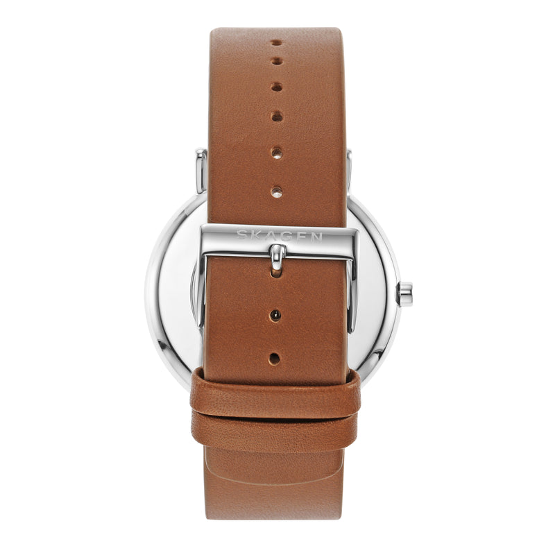 Wristwatch with a silver case and brown leather strap.