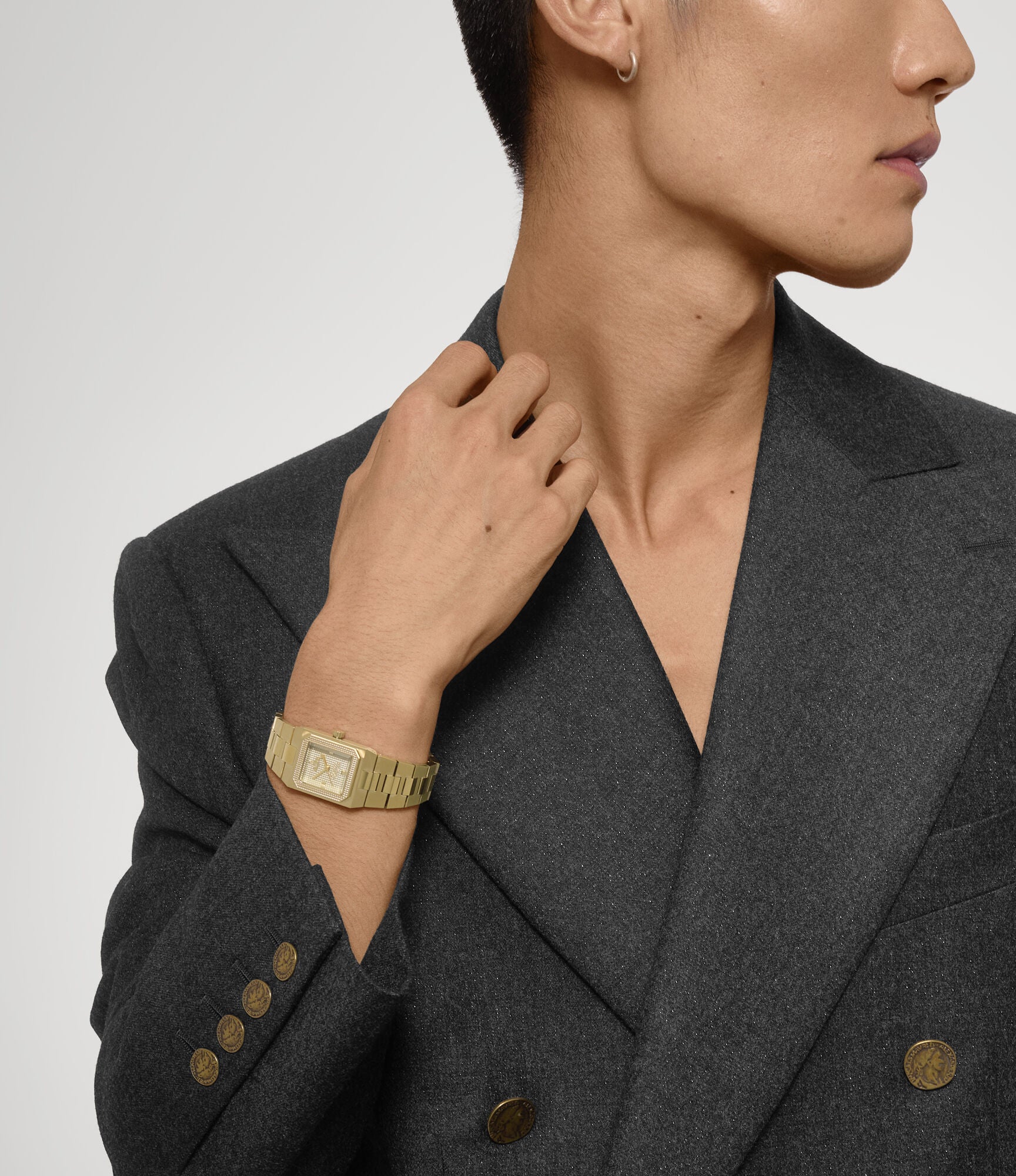 Vivienne Westwood The Brunswick women's watch with a olive dial and gold stainless steel bracelet. Close-up detail view.
