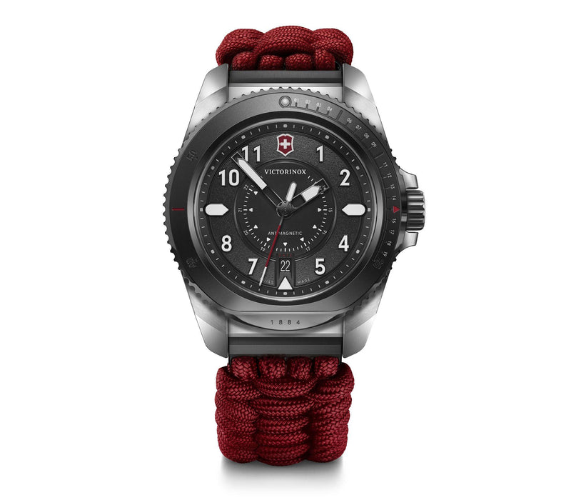 Rugged wristwatch with a black dial and red paracord-style band.