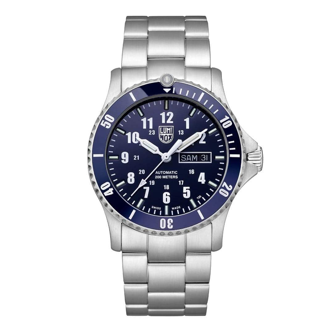 Silver wristwatch with a blue dial and rotating bezel.