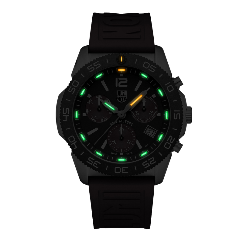 Black wristwatch with luminous green and yellow markings on the dial.