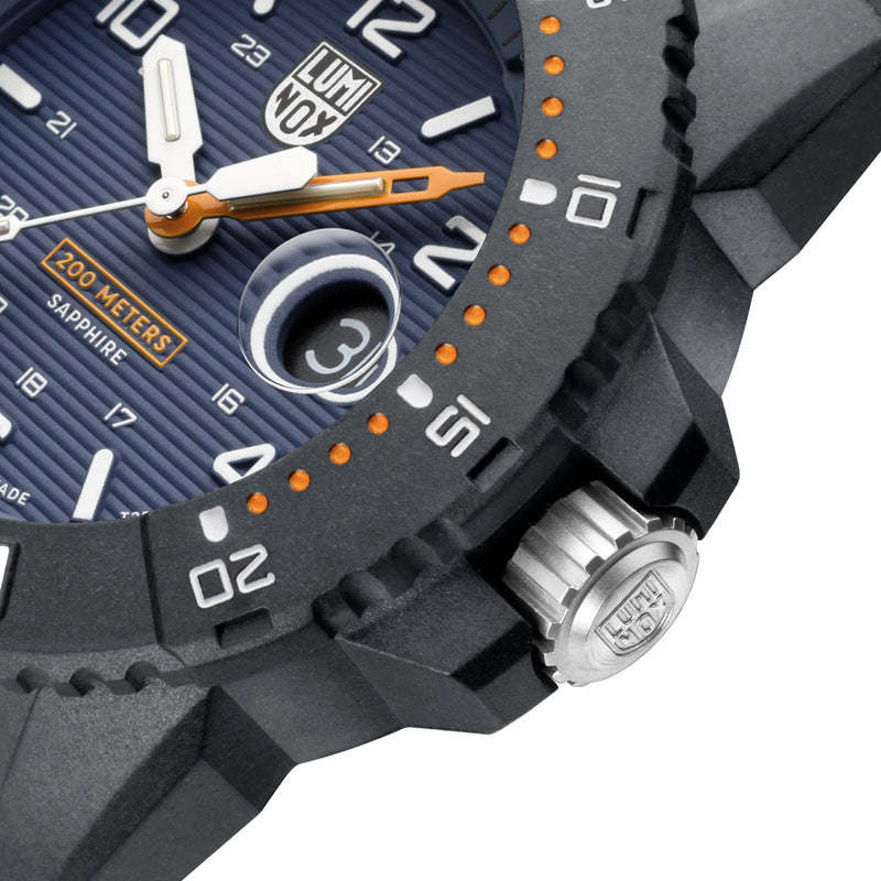 Rugged sports watch with a navy blue dial and orange accents.