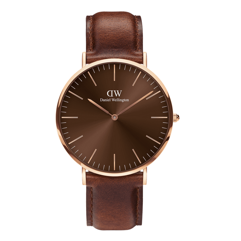 Elegant wristwatch with a brown leather strap and rose gold-toned case.