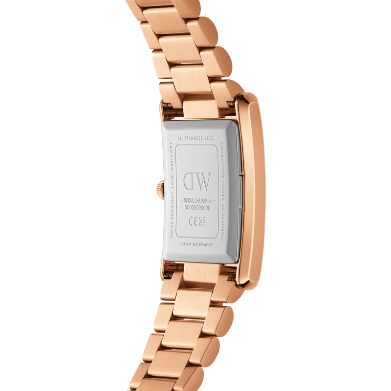 Rose gold wristwatch with a rectangular face and metal link bracelet.