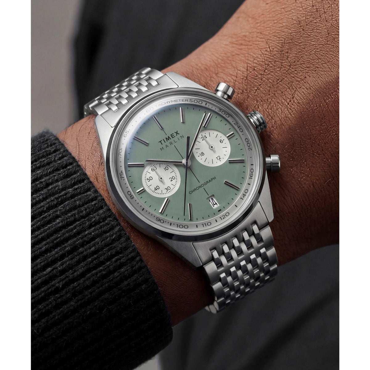 Timex Marlin Jet Chronograph TW2Y89800 sage green dial on a stainless steel bracelet, worn on the wrist