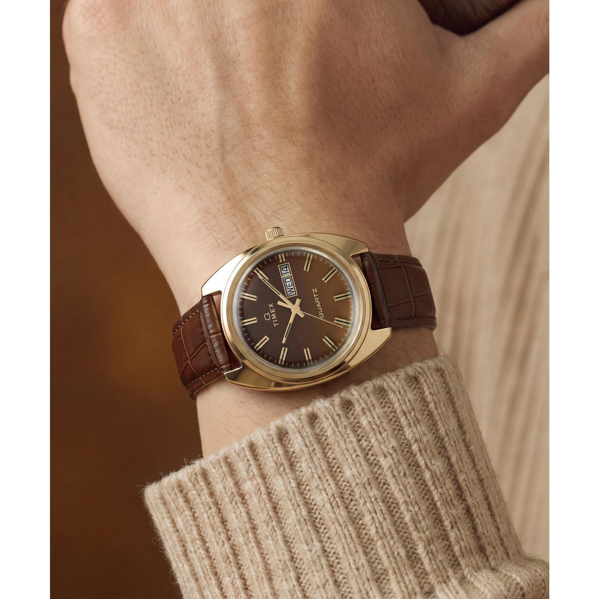 Timex 1978 Day Date TW2Y87200 brown gradient dial on a brown leather strap, worn on the wrist