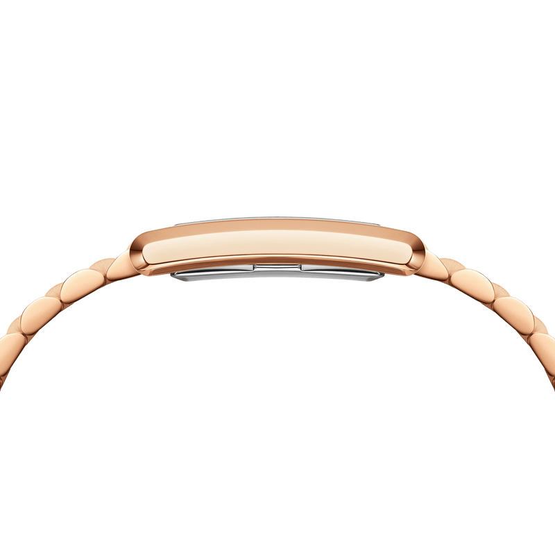 Rose gold wristwatch band with a sleek, curved design.