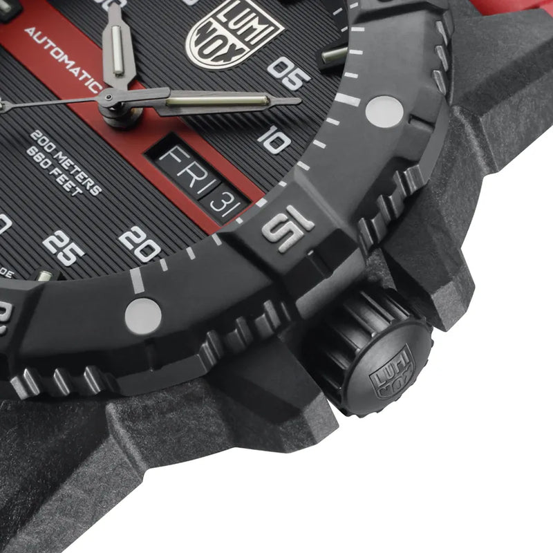 Close-up view of a rugged wristwatch face with analog hands and digital display elements.