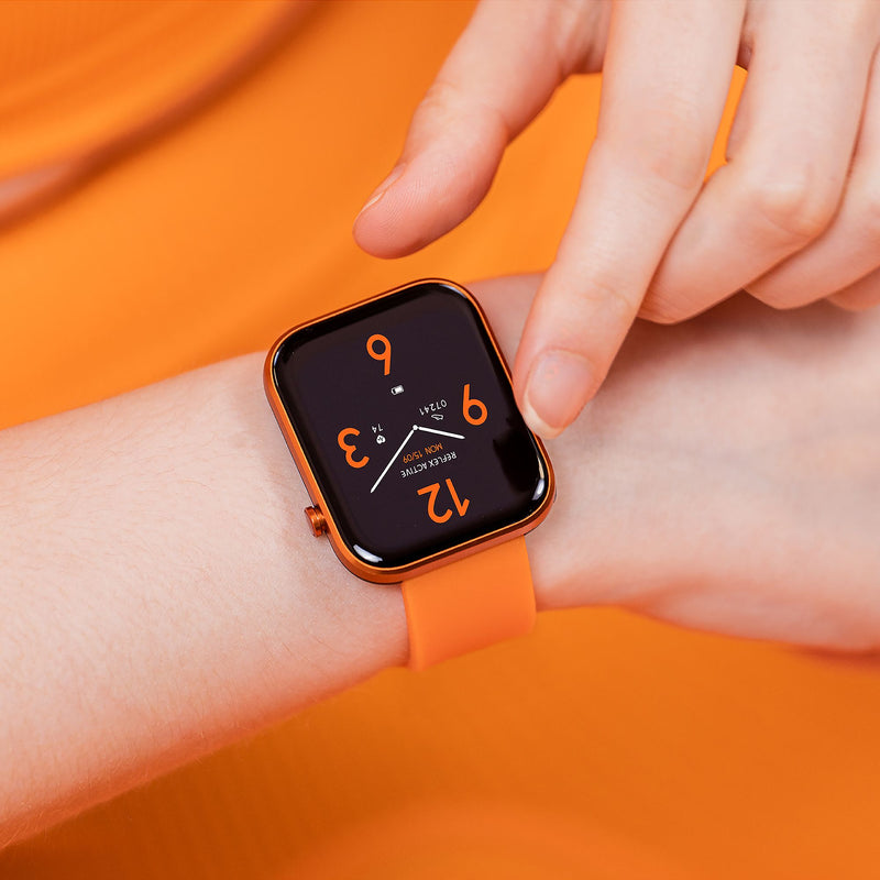 Orange smartwatch with a black digital display showing the time.