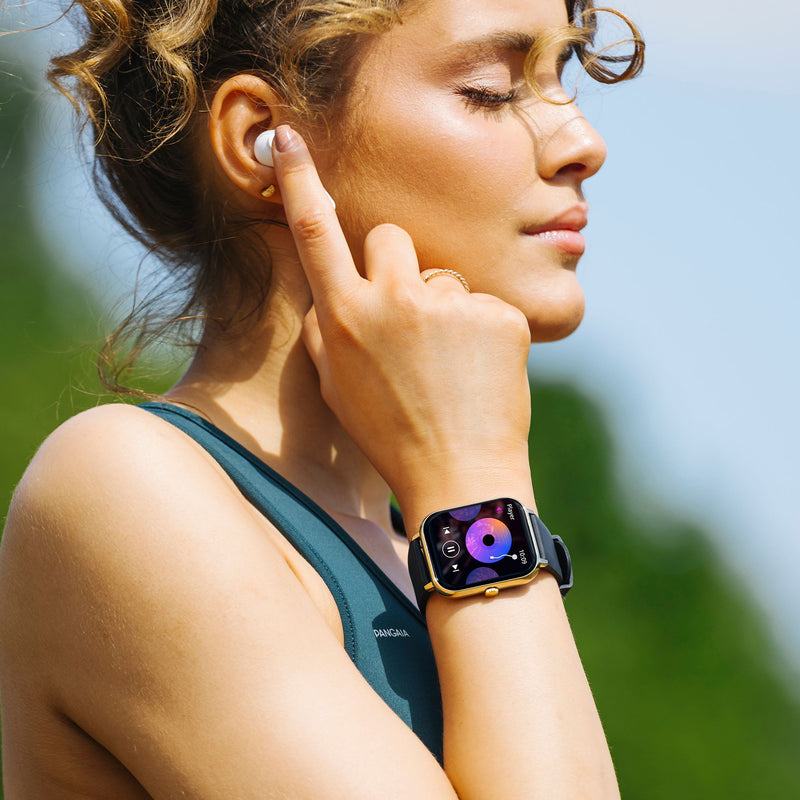 Smartwatch with a colorful display worn on a person’s wrist.