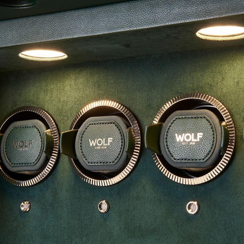WOLF Athos 20 Piece Watch Winder Safe in Green, close-up of the lit watch winder modules