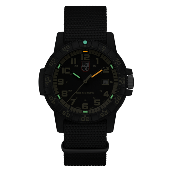 Black tactical wristwatch with luminous markings on the dial and a fabric strap.