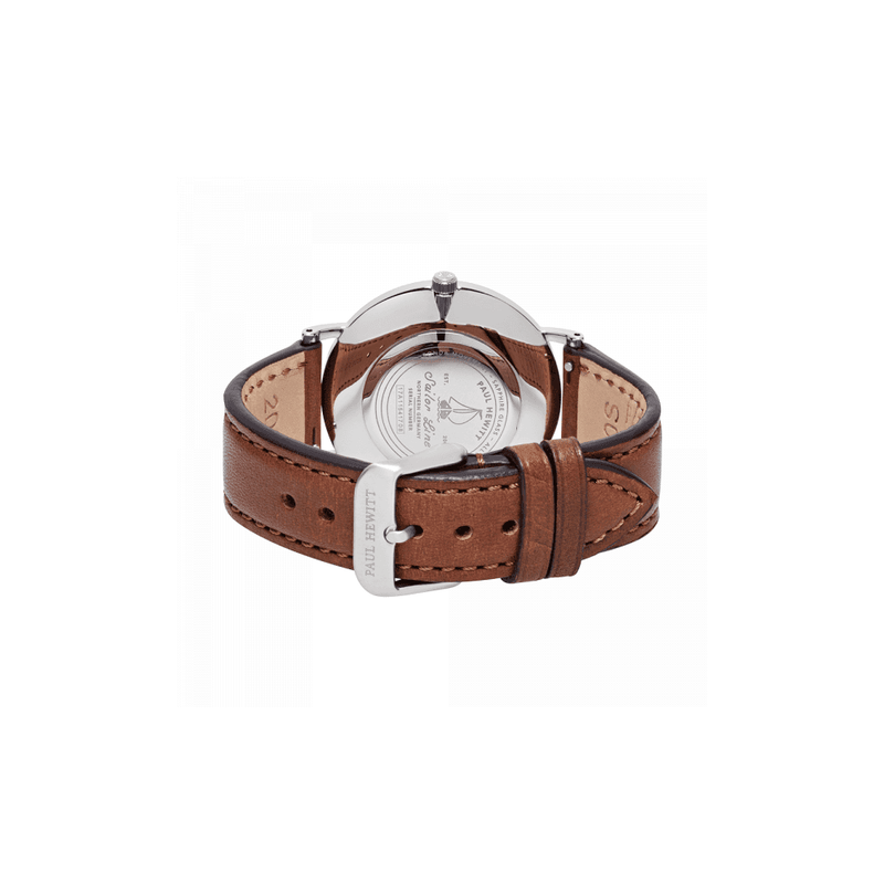 Brown leather watch strap with a silver buckle.