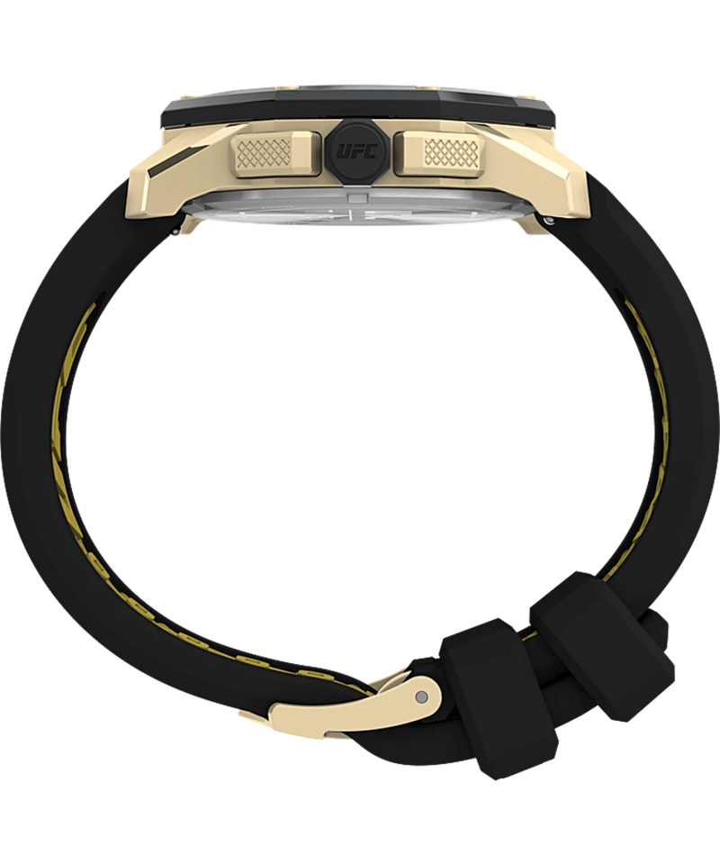 Gold-toned wristwatch with a black rubber strap.