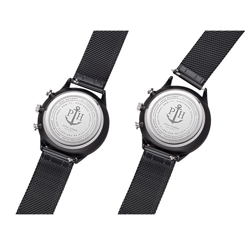 Two wristwatch backs with anchor logos engraved on their metal casings.