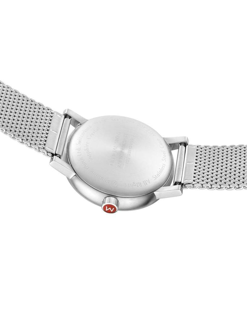 Silver wristwatch with a mesh metal band and a round face.