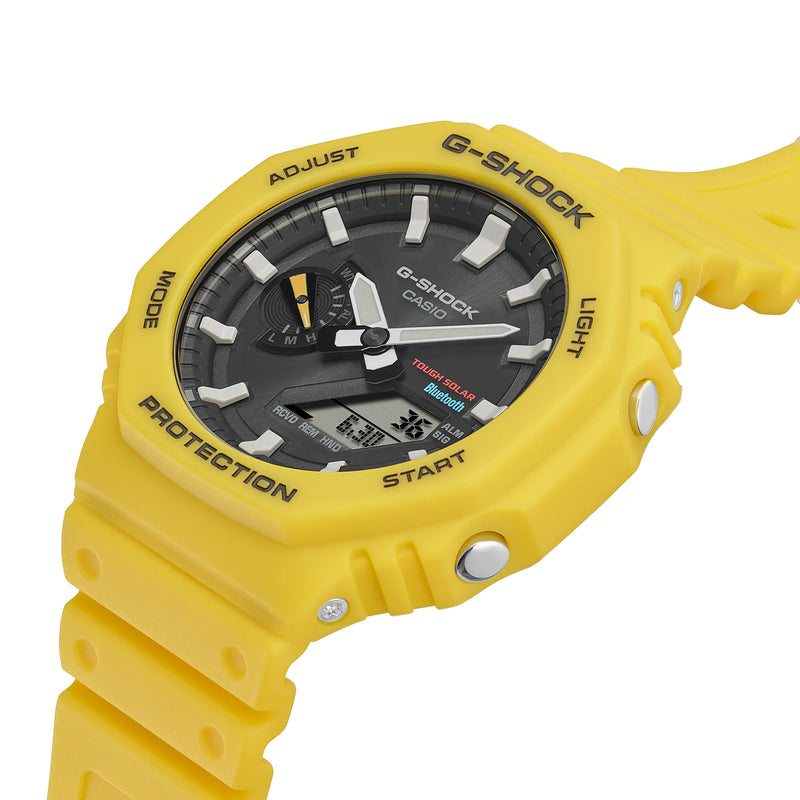 Yellow G-Shock wristwatch with a black analog-digital display face.