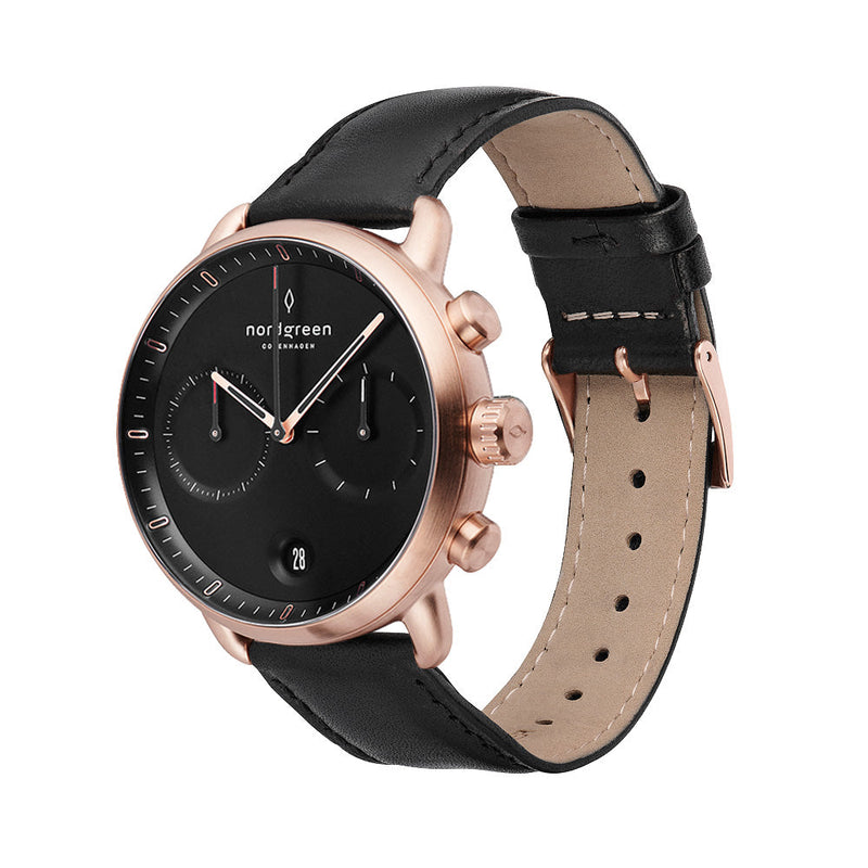 Elegant wristwatch with a black leather strap and rose gold-toned case.