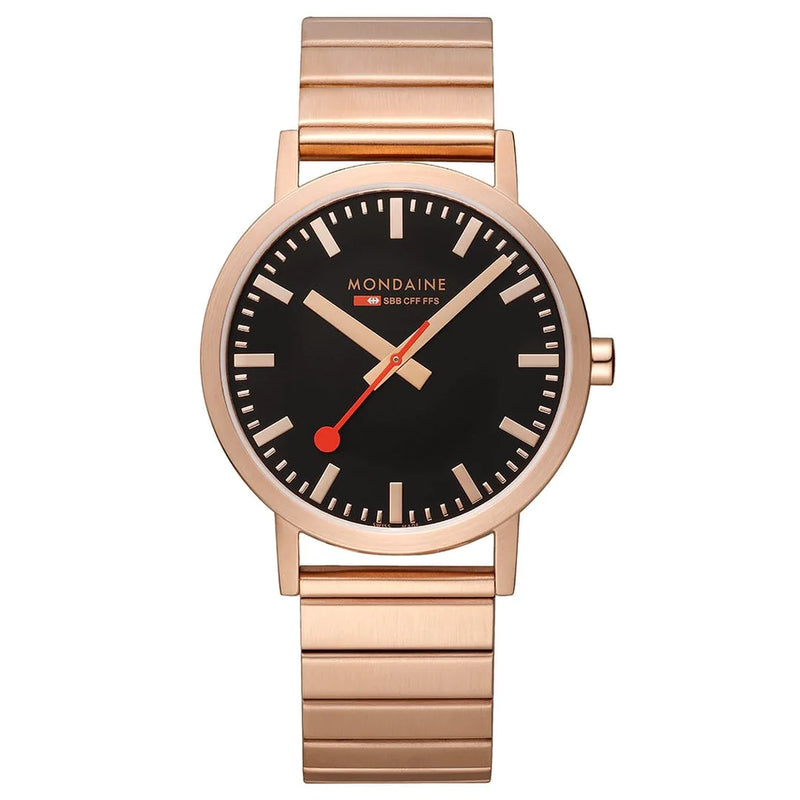 Rose gold wristwatch with a black dial and red second hand.