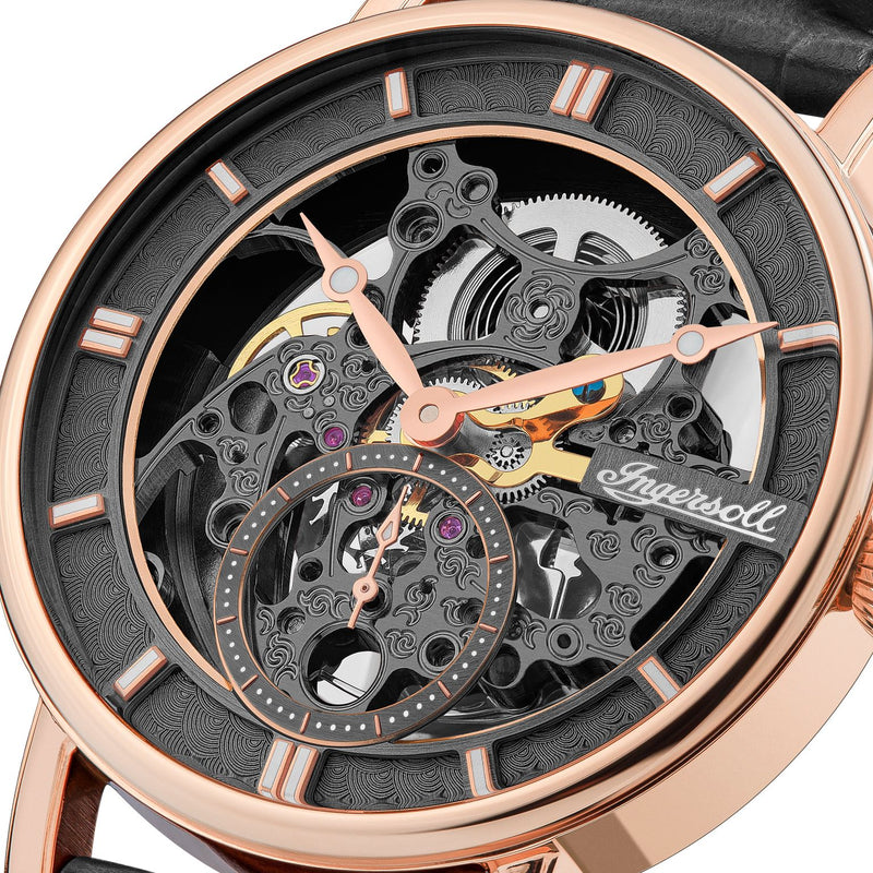 Skeleton-style mechanical watch face with rose gold accents and visible gears.