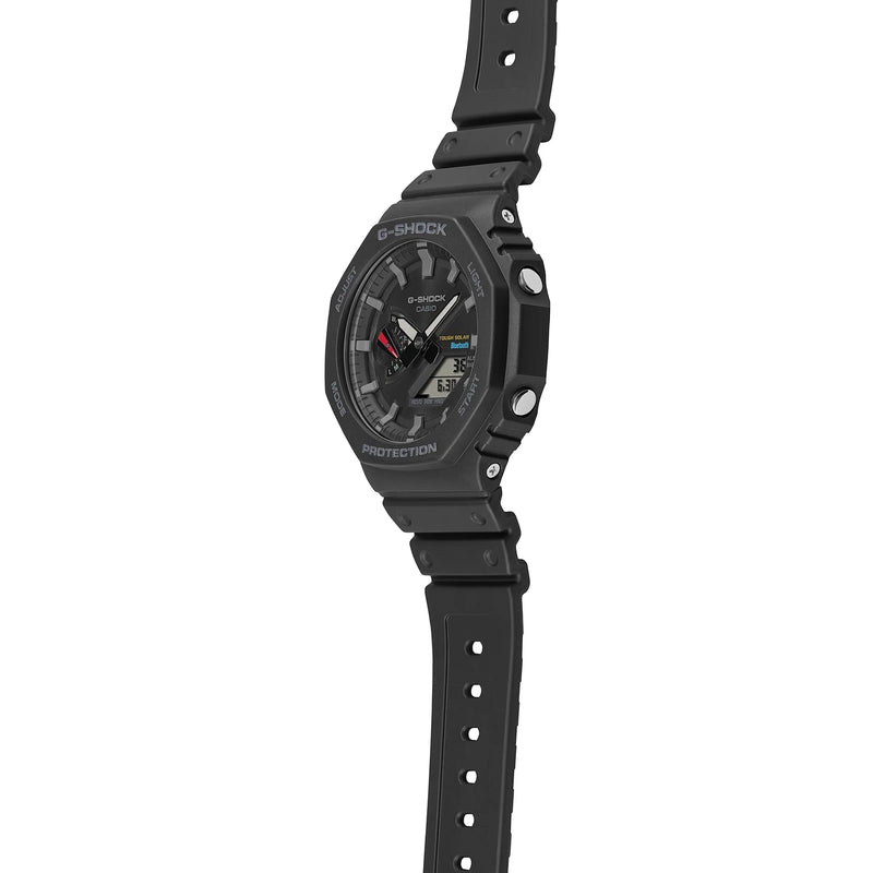 Black sports watch with a rugged design and digital-analog display.