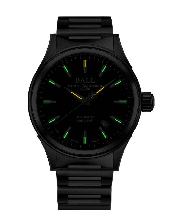 Black wristwatch with luminous green hour markers and a yellow second hand.