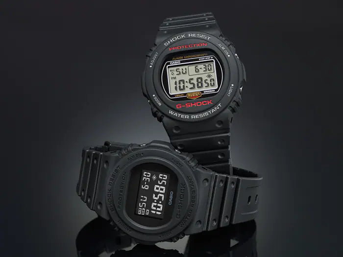 Two black digital G-Shock watches with rectangular displays.