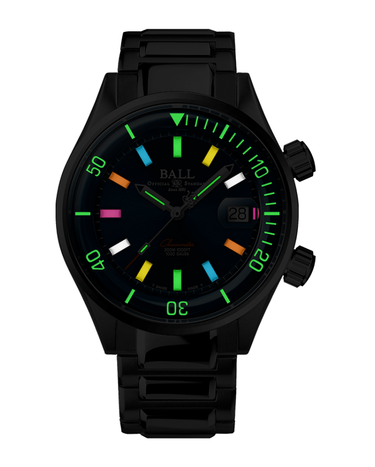 Black wristwatch with colorful luminous markers on the dial and bezel.